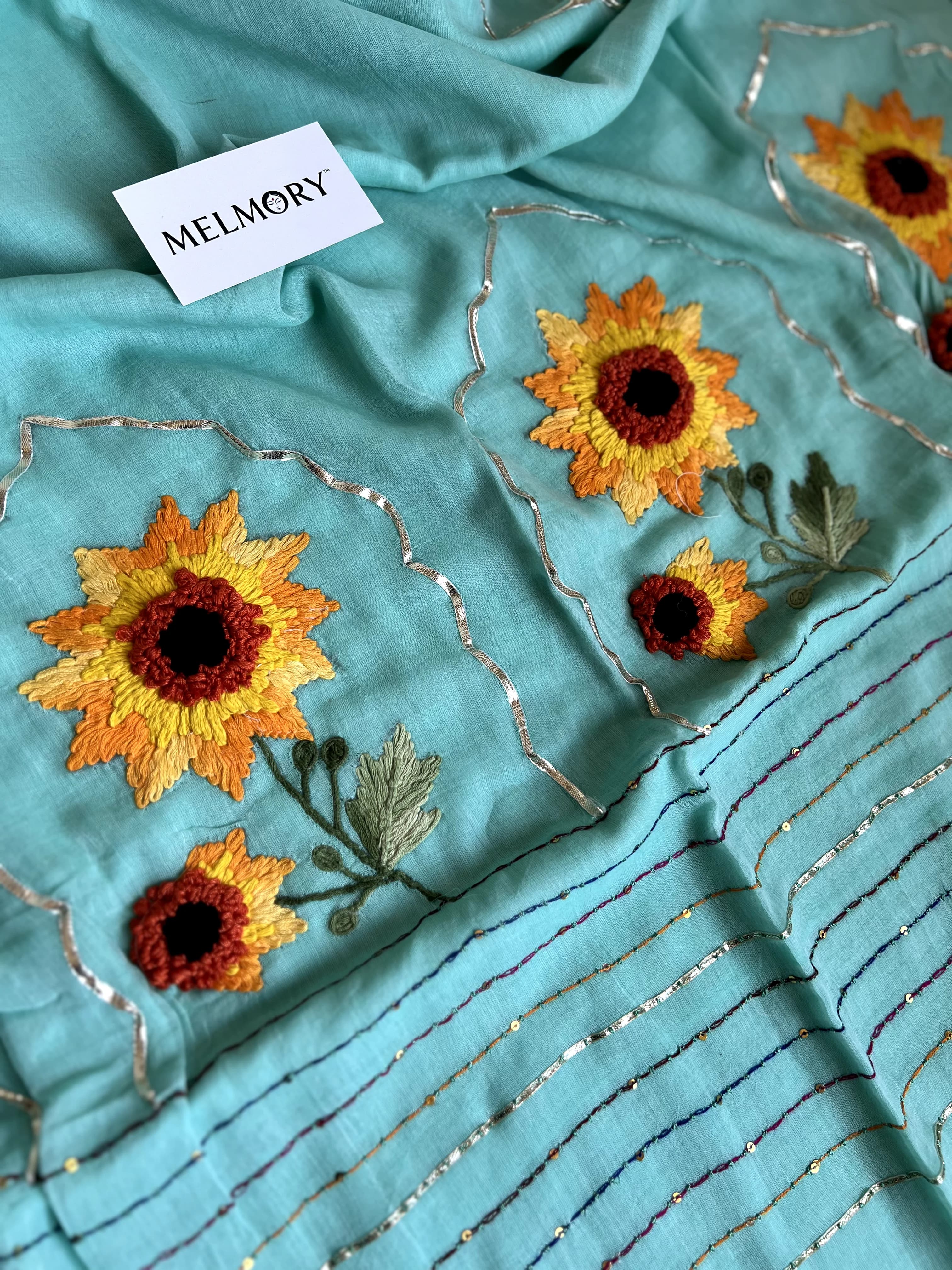 Sunflower Handstitched Embroidery Mul Saree - Light Teal